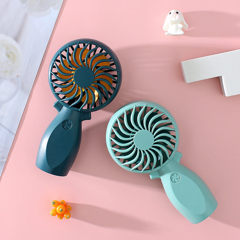 Women's portable hand fan with ergonomic grip and powerful battery technology Stornfield