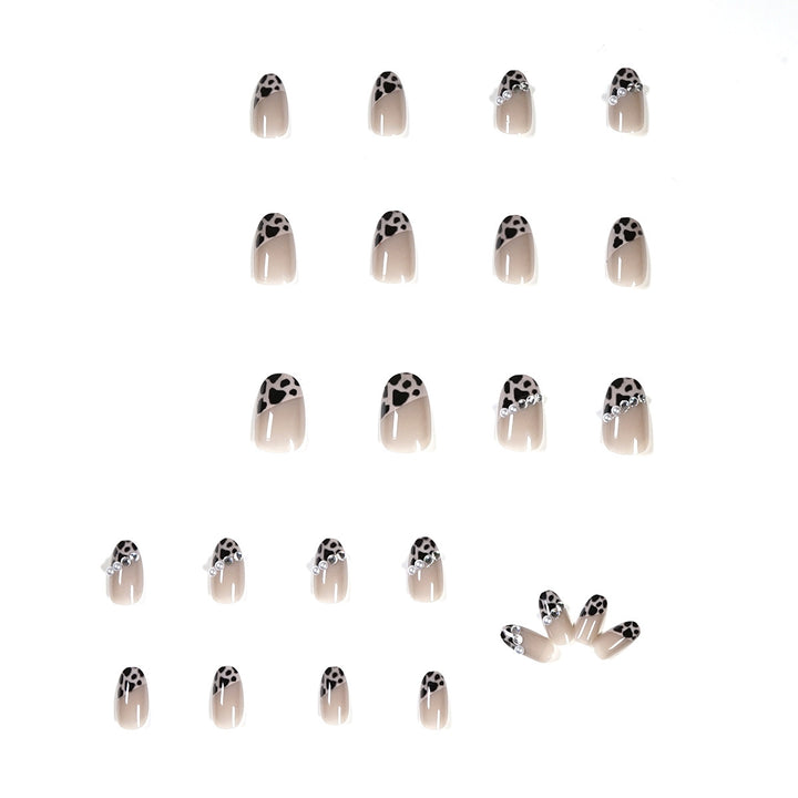 Artificial nail set with glamorous leopard pattern and elegant pearl decorations Stornfield