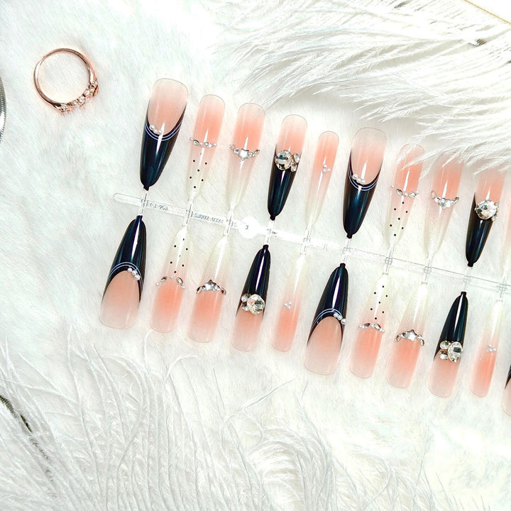Elegant Artificial Nails with Glitter Accents and Fashionable Design Stornfield