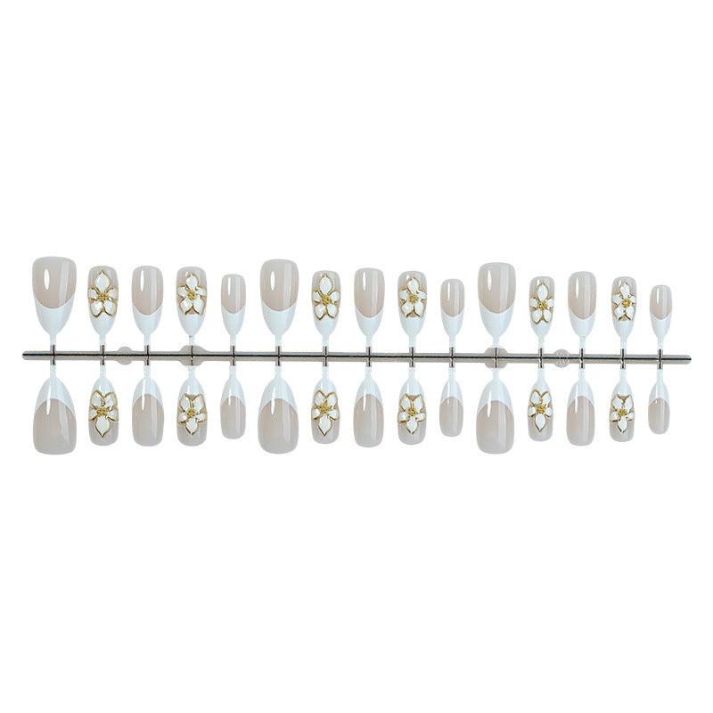Artificial nail set with elegant flowers and glitter decorations Stornfield