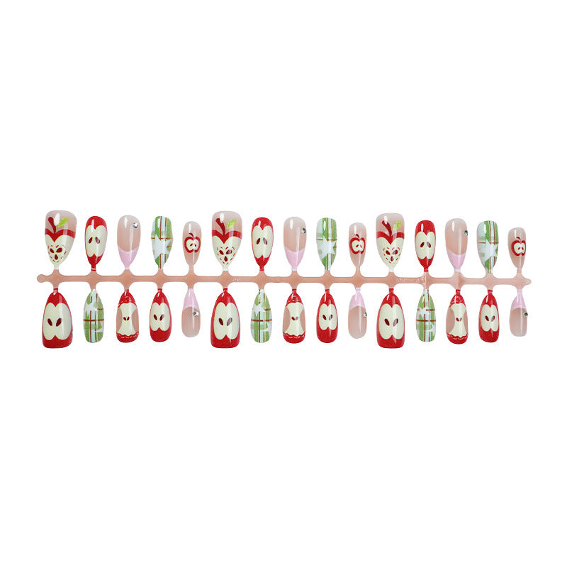Artificial nail set with cheerful apple and star pattern Stornfield