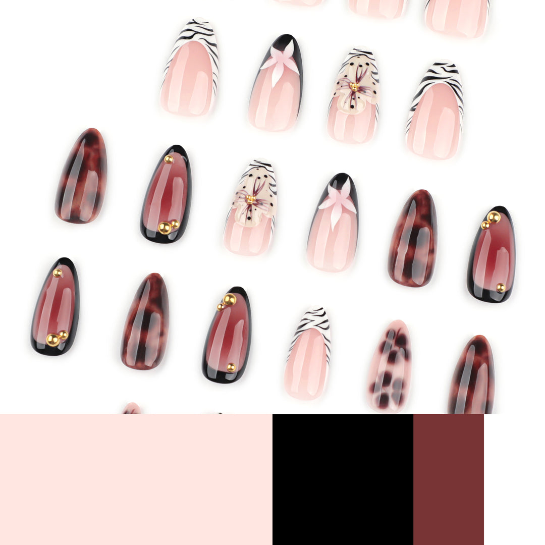 Nail Art with elegant flower design and glitter accents Stornfield
