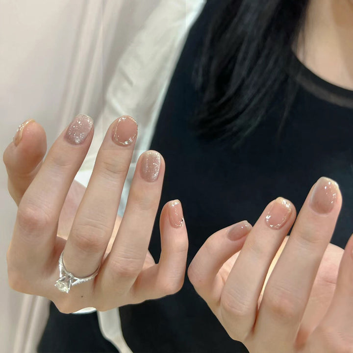 Artistic Press-On Nail Set with Glittery Star Accents Stornfield
