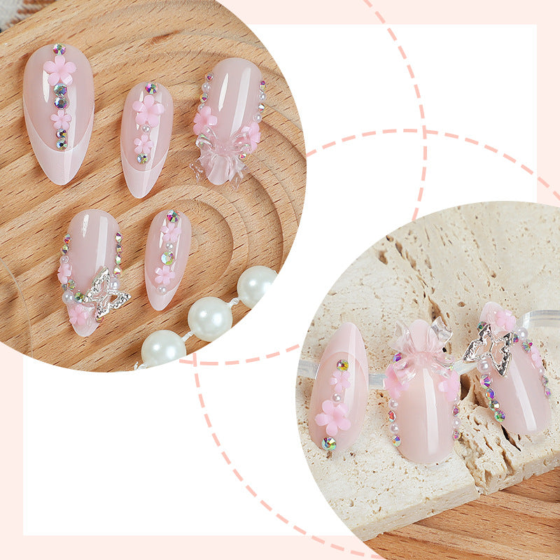 Creative nail art set with playful flower and glitter accents Stornfield