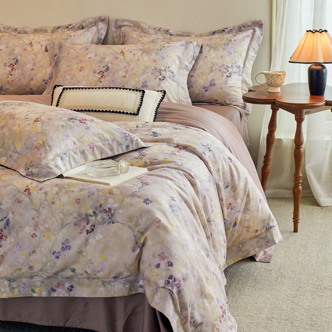 Luxurious cotton satin bed linen set with millefleurs floral pattern and fine piping