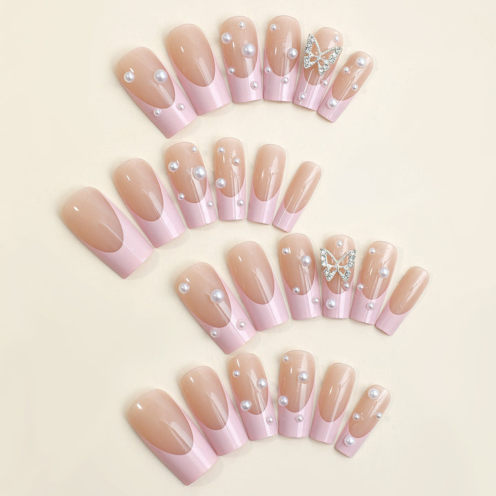 Acrylic nail set with stylish 3D pearl and glitter decorations Stornfield