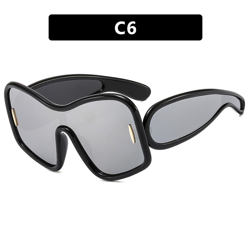 Women’s futuristic sunglasses with extra wide design and protective UV filter Stornfield