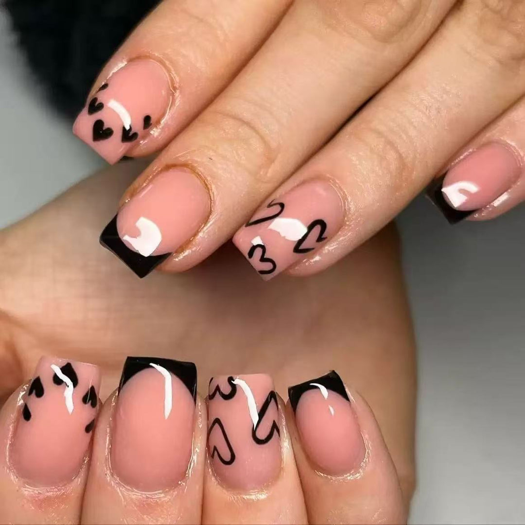 Artificial nail set with creative heart and black-and-white design Stornfield