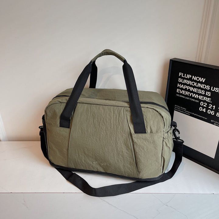 Sporty travel bag with practical outer pockets Stornfield