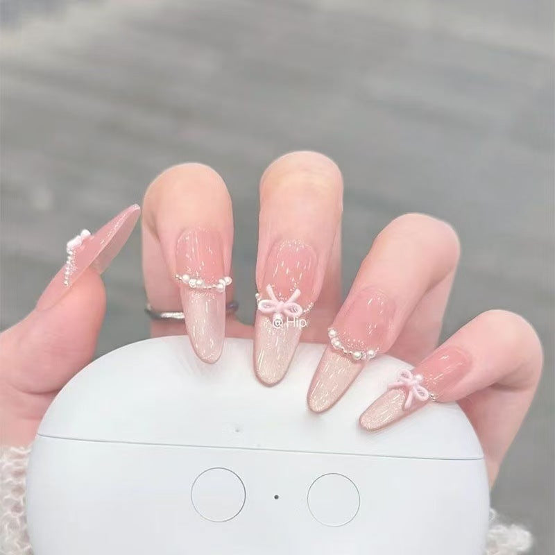 Elegant Stiletto Nail Art Tips with Pearl Accents