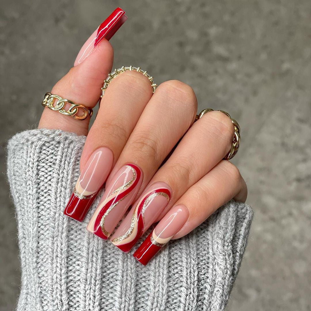 Glamorous artificial nails with elegant wave pattern and glitter accents Stornfield