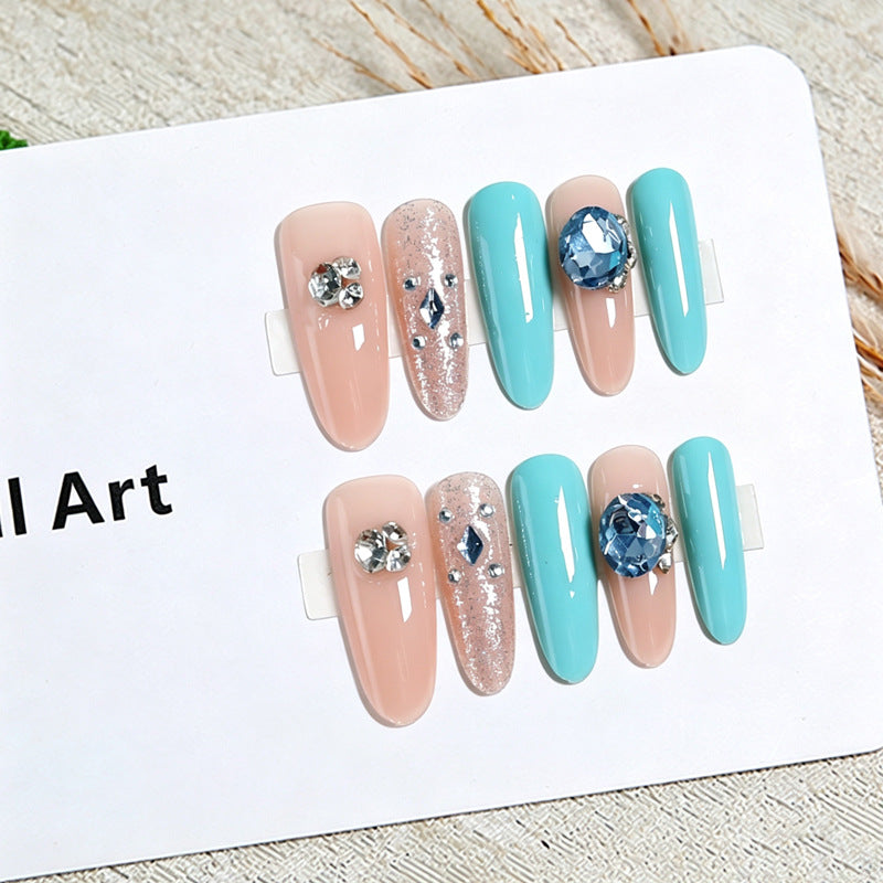 Artificial nail set with glamorous 3D applications and sparkling design Stornfield