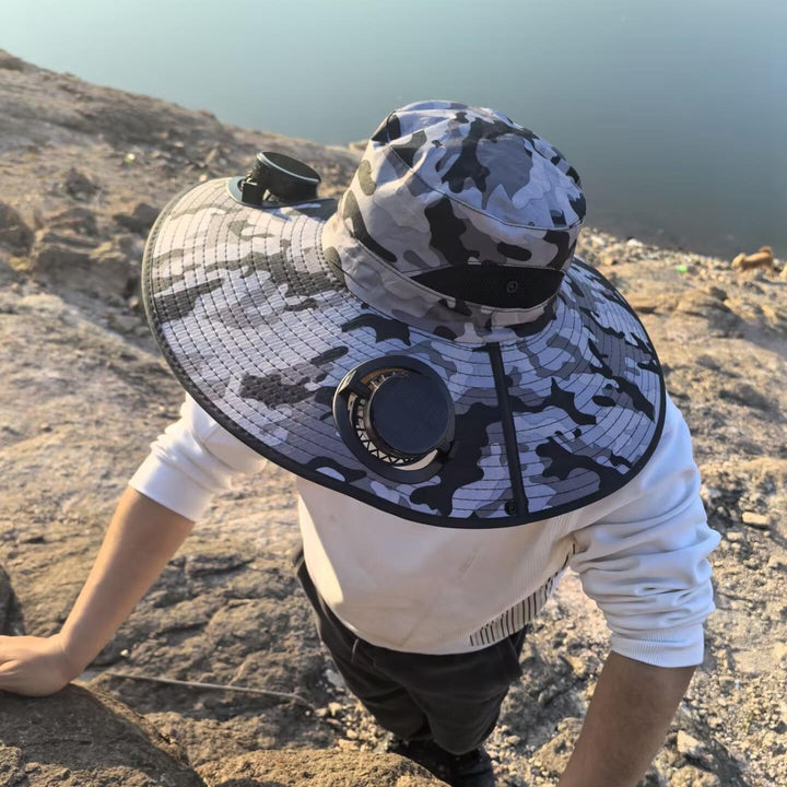 Ventilated sun hat with integrated solar fans and wide brim Stornfield