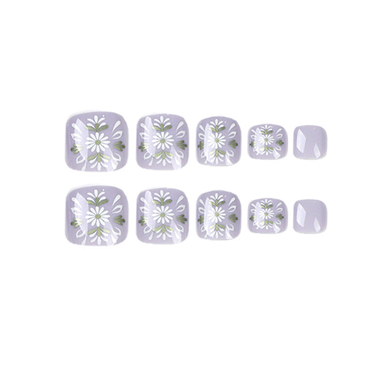Artistic toenail design with elegant floral design Stornfield