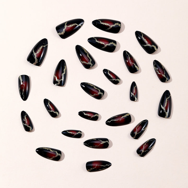 Glossy Stiletto Nail Art Extensions with Gold Accents Stornfield