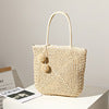 Handmade straw bag with pompom details Stornfield
