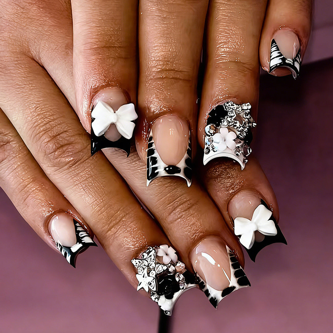 Elegant artificial nails with detailed embellishments Stornfield
