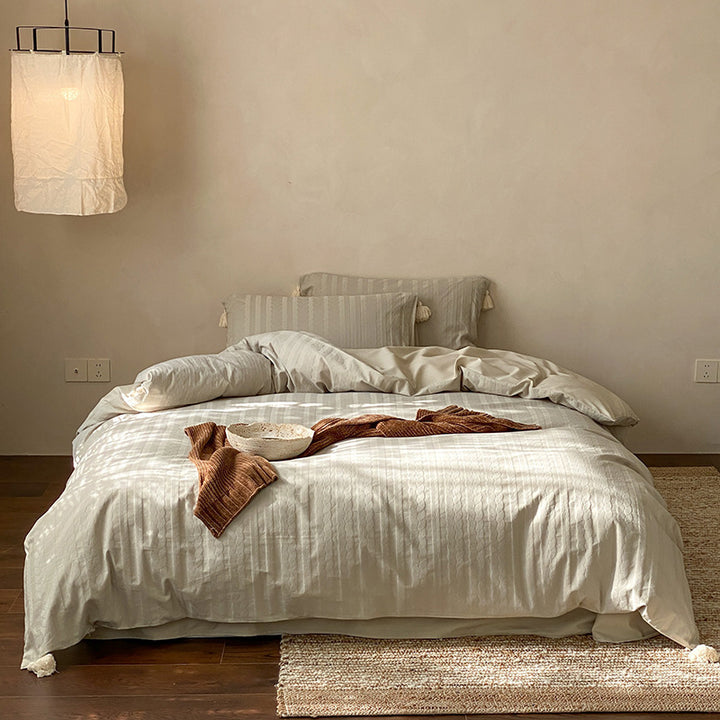 Finely textured cotton satin bedding set with tone-on-tone relief