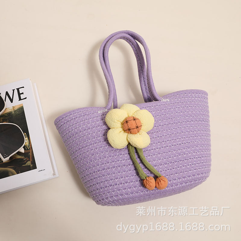 Handcrafted basket bag with floral accents Stornfield