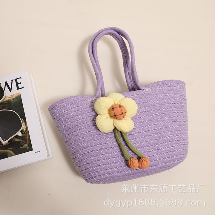 Handcrafted basket bag with floral accents Stornfield
