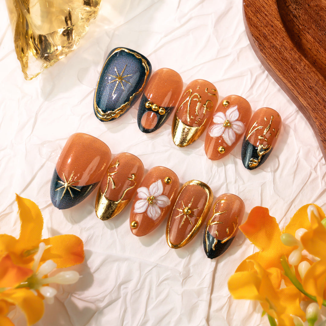 Artistic Floral Press-On Nail Art with Gold Accents Stornfield