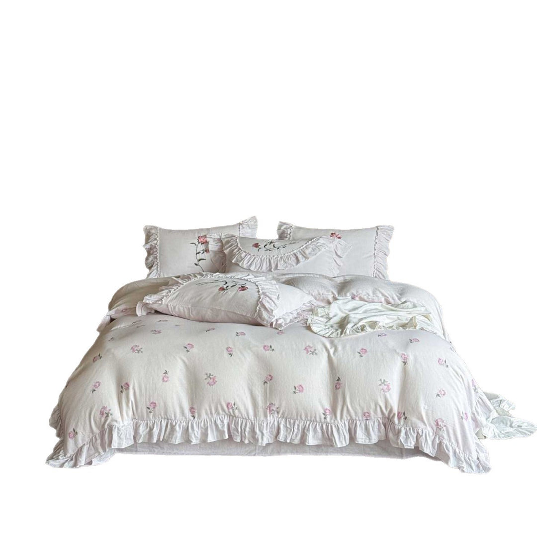 Romantic bedding set with ruffles and rose embroidery