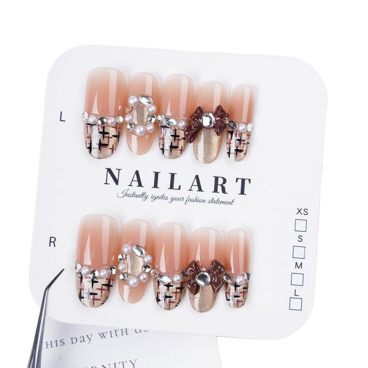 Decorative Bow and Gemstone Press-On Nails Stornfield