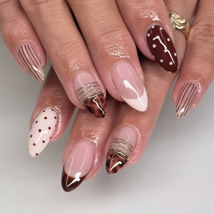 Elegant Stiletto Nails with Creative Glittering Design Stornfield