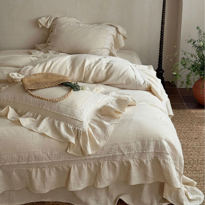 Bedding set in country style with ruffle details and fine embroidery