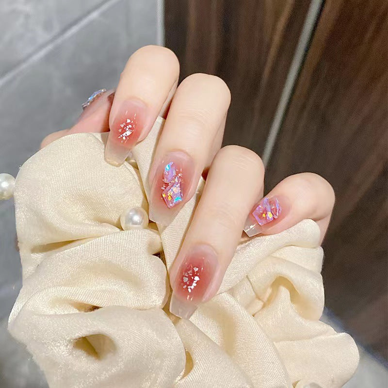 Artistic acrylic nails with glitter elements Stornfield