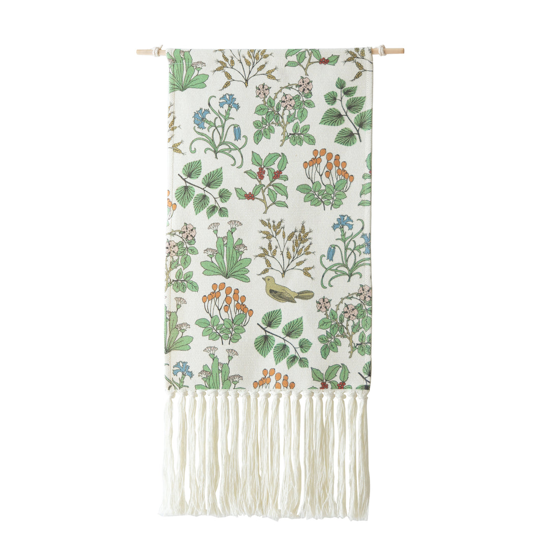 Woven wall hanging with floral jacquard structure and long fringes Stornfield