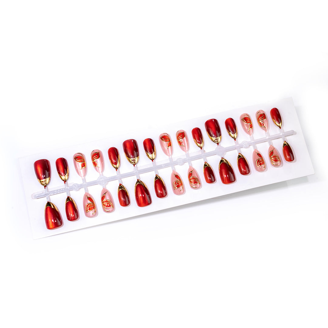Artistic Press-On Nail Set with Floral and Metallic Accents Stornfield