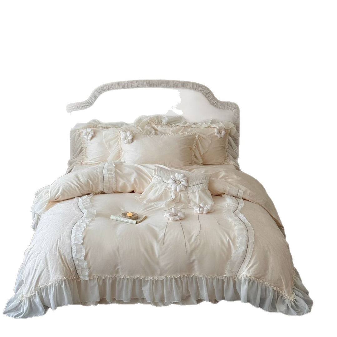 Romantic bedding set made of cotton satin with ruffled flounce, layered ruffles, and decorative fabric flowers