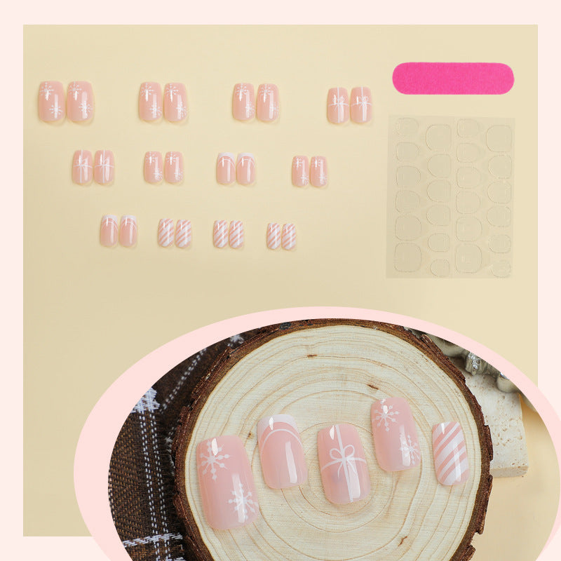 Nail set with elegant floral and striped designs Stornfield