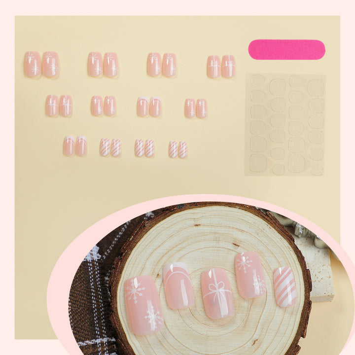 Nail set with elegant floral and striped designs Stornfield