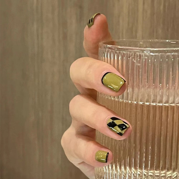 Creative nail art with geometric patterns Stornfield