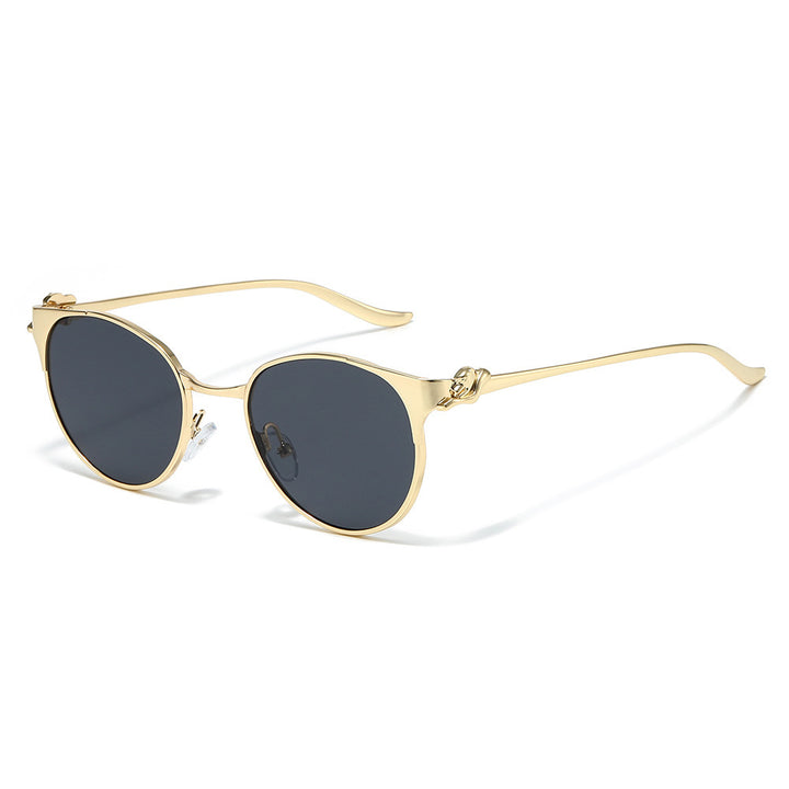 Elegant Cat-Eye Sunglasses with Decorative Gold Accents Stornfield