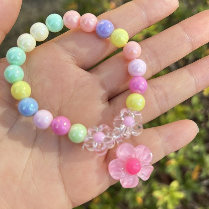 Colorful bracelet with flower charms Stornfield