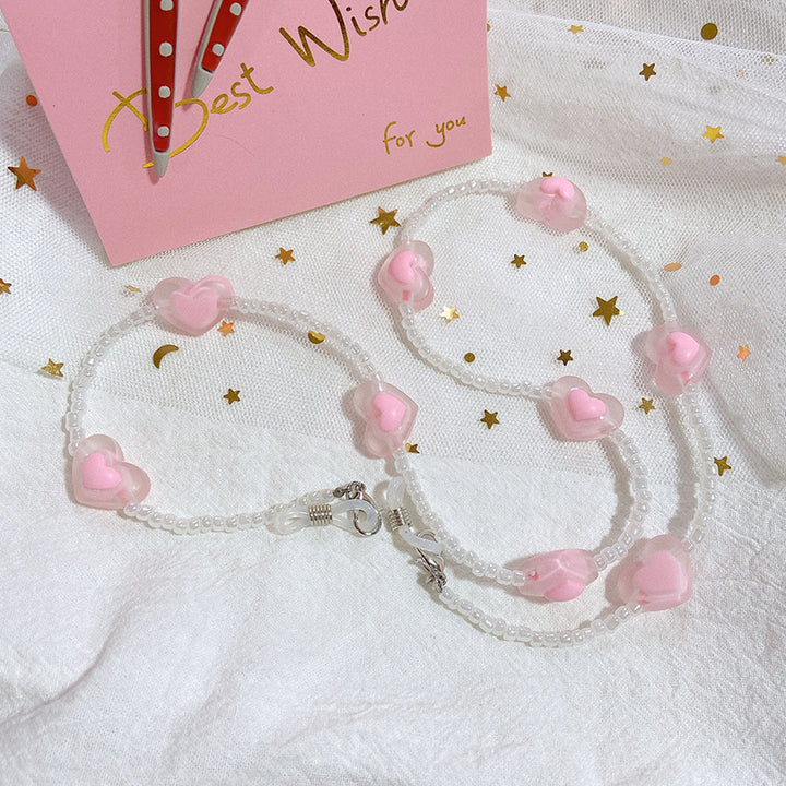 Fashionable glasses strap with heart pendants Stornfield