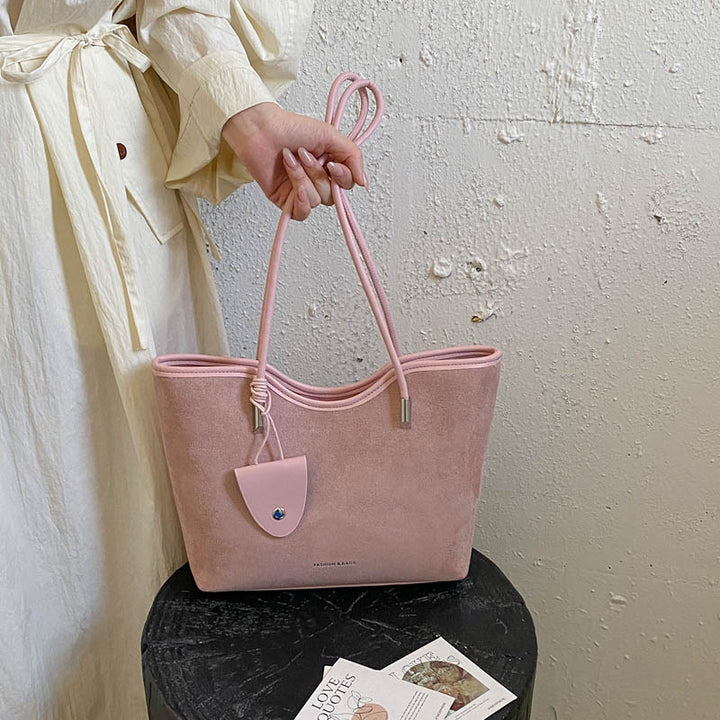 Chic Suede Tote with Decorative Pocket