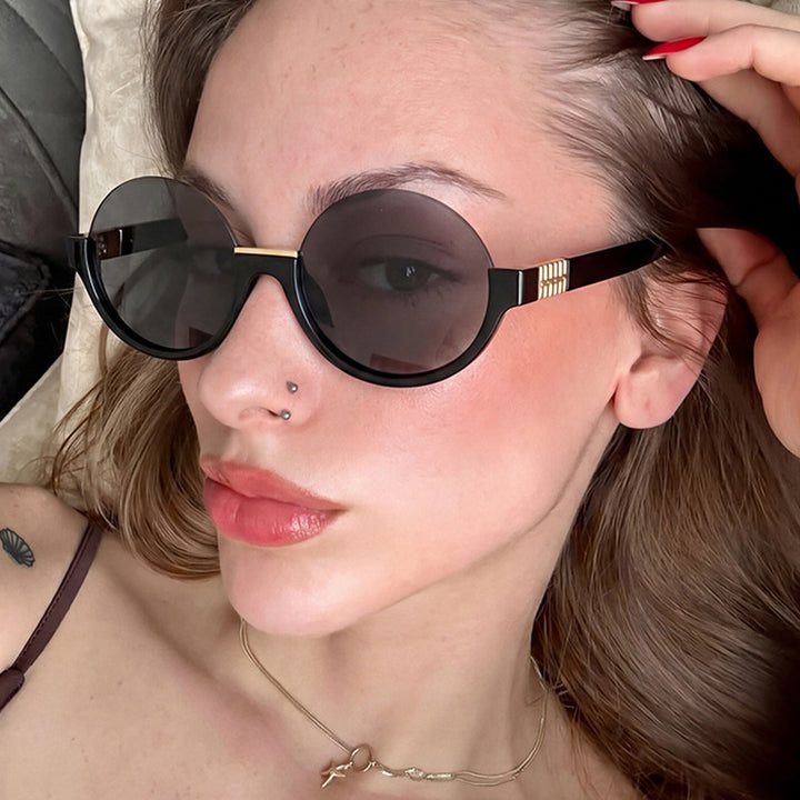 Women’s modern round sunglasses with elegant accents and UV protection Stornfield