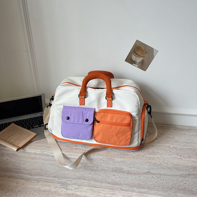 Sporty travel bag with multiple pockets and adjustable shoulder strap Stornfield