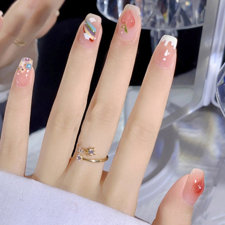 Creative nail art set with colorful fruit motifs and stylish designs Stornfield
