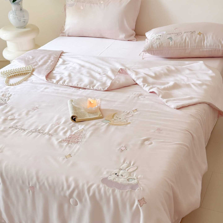 Cotton satin children's bedding set with embroidered cloud and animal appliqués