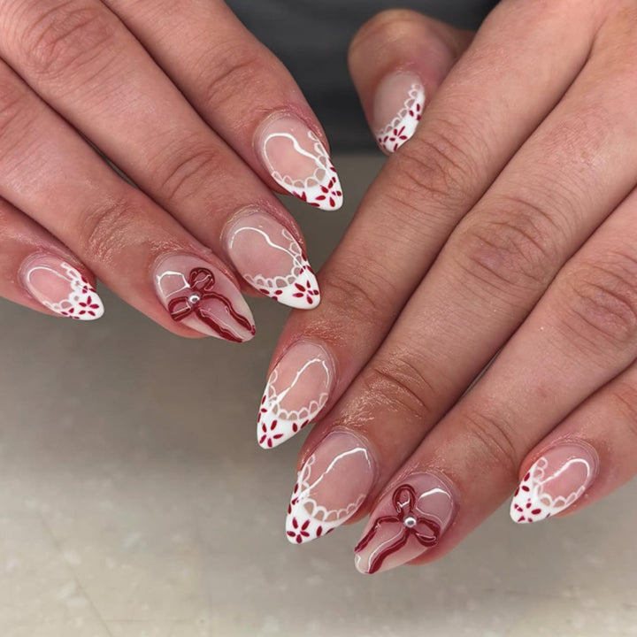 Artful acrylic nails with elegant floral accents Stornfield