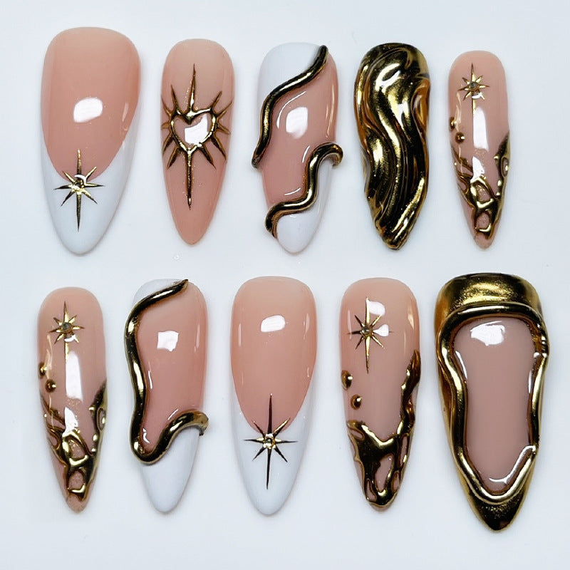 Acrylic nail set with luxurious gold accents and elegant designs Stornfield