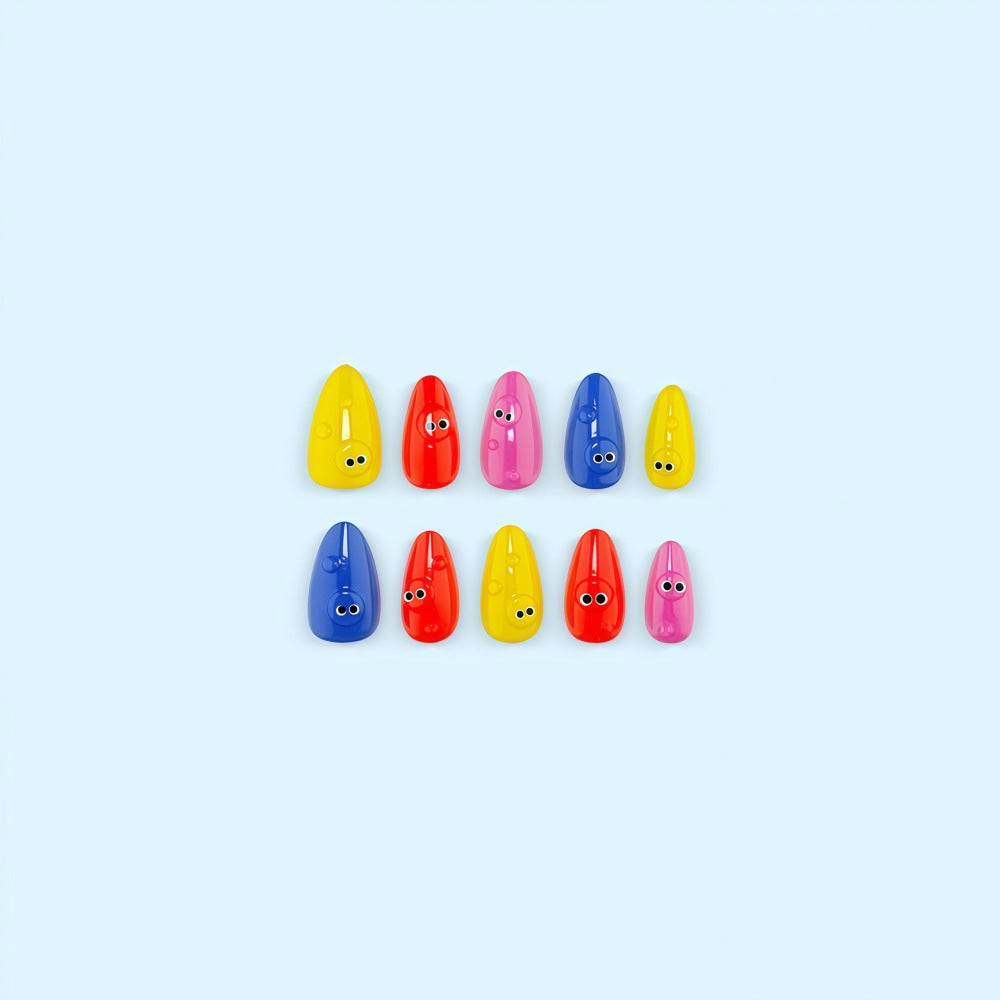 Creative artificial nails with funny faces and colorful accents Stornfield