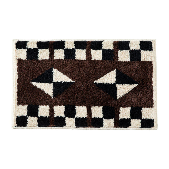 Tufted, soft bath mat with geometric ethnic pattern and non-slip underside Stornfield