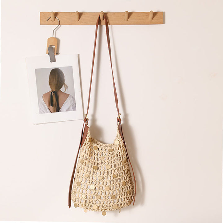 Hand-knotted shoulder bag with metal appliqués Stornfield