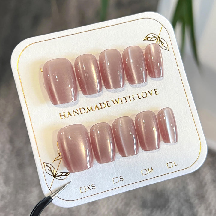 Artificial nail extensions with glossy finish Stornfield